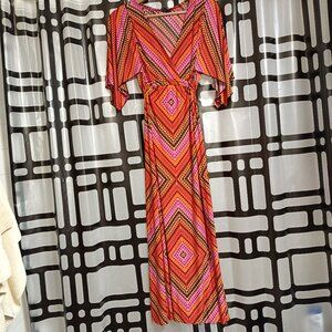 **✨ Effortless Elegance – The Enfocus Maxi Dress with Flutter Sleeves! ✨**